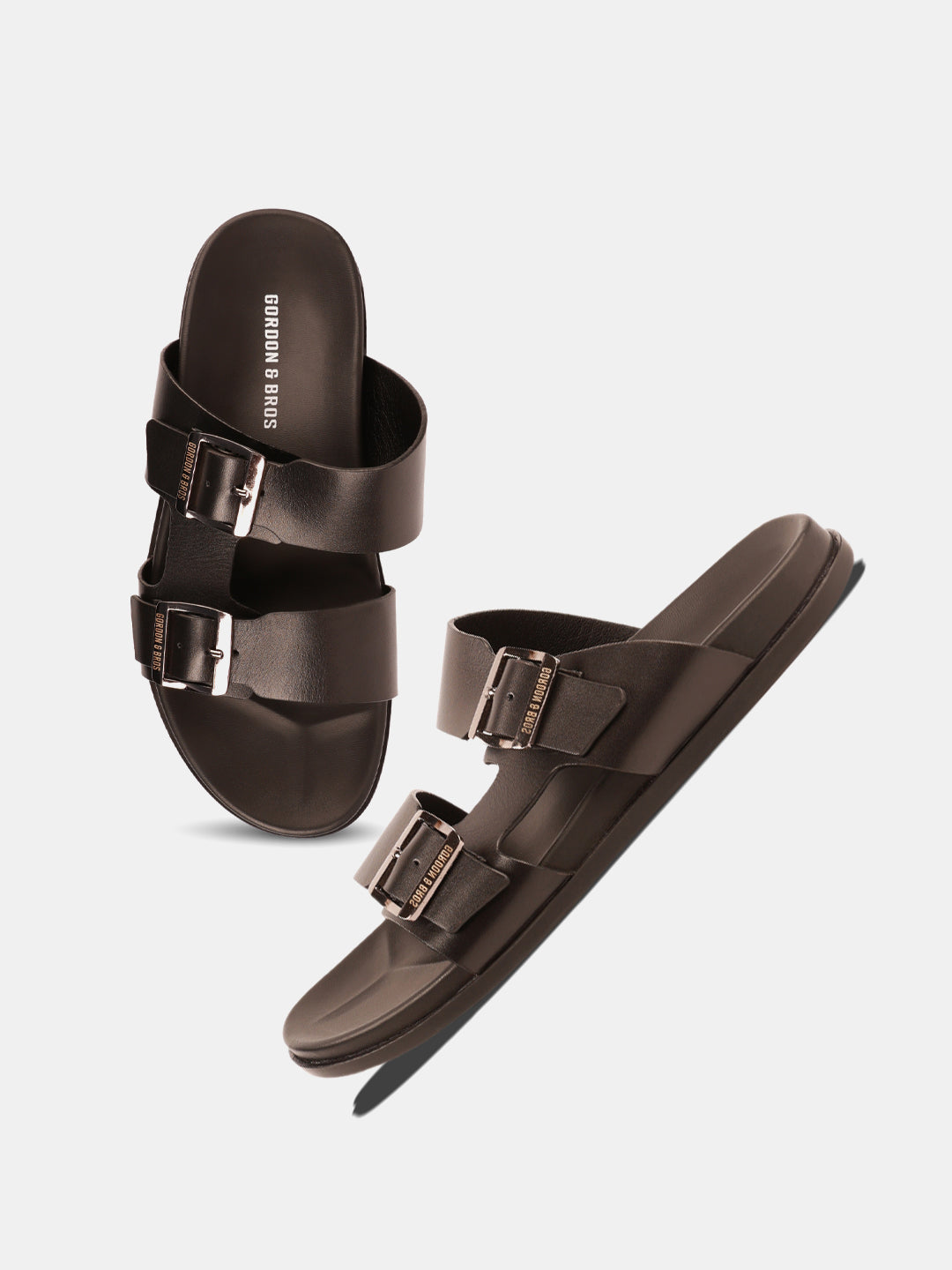 "Men’s black leather sandals with dual buckle design — sleek and comfortable footwear for everyday wear. With White Background