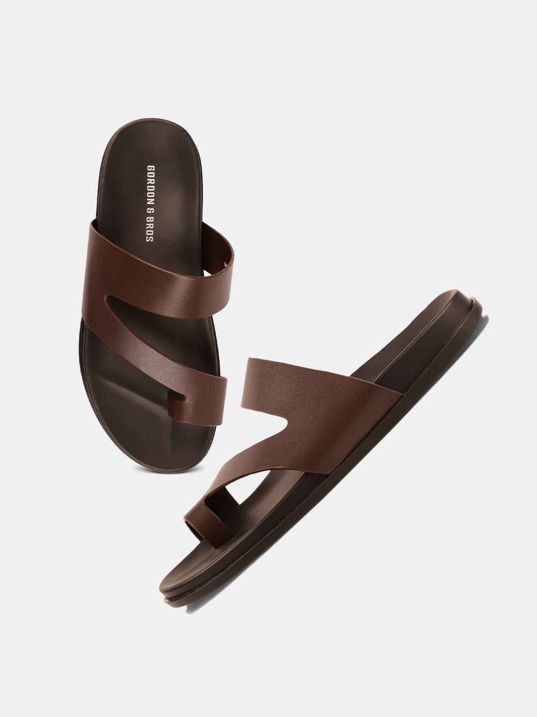 Brown leather sandals for men with slip-on design and cushioned footbed — perfect for casual and everyday wear.With white background