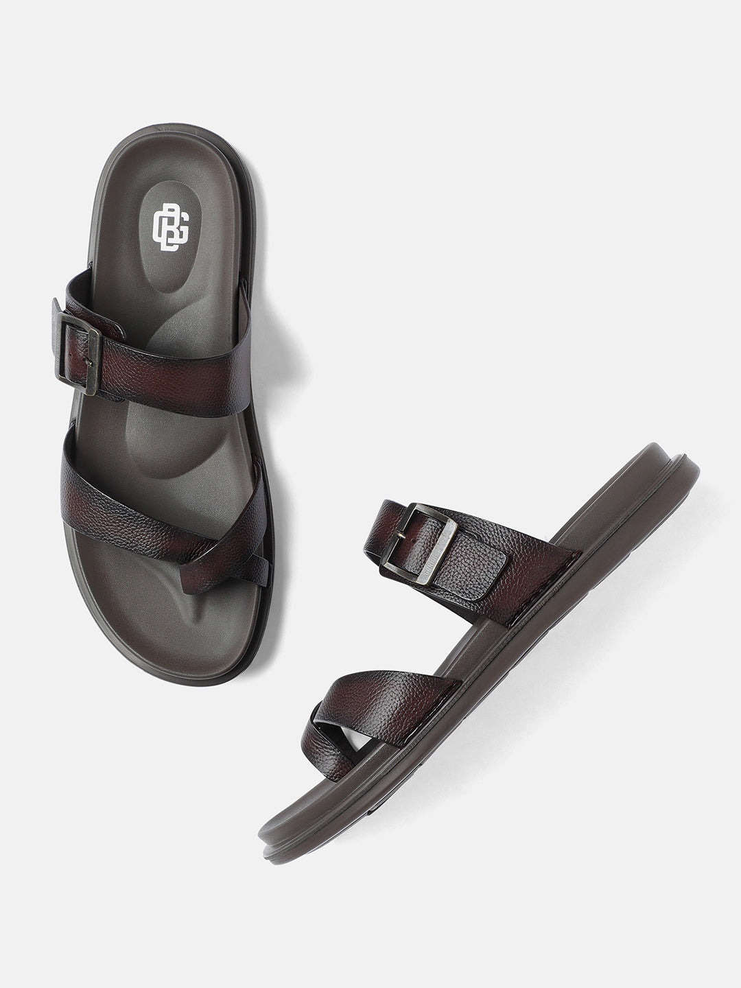 A pair of burgundy men's sandals with adjustable straps and buckle closures, displayed against a white background.