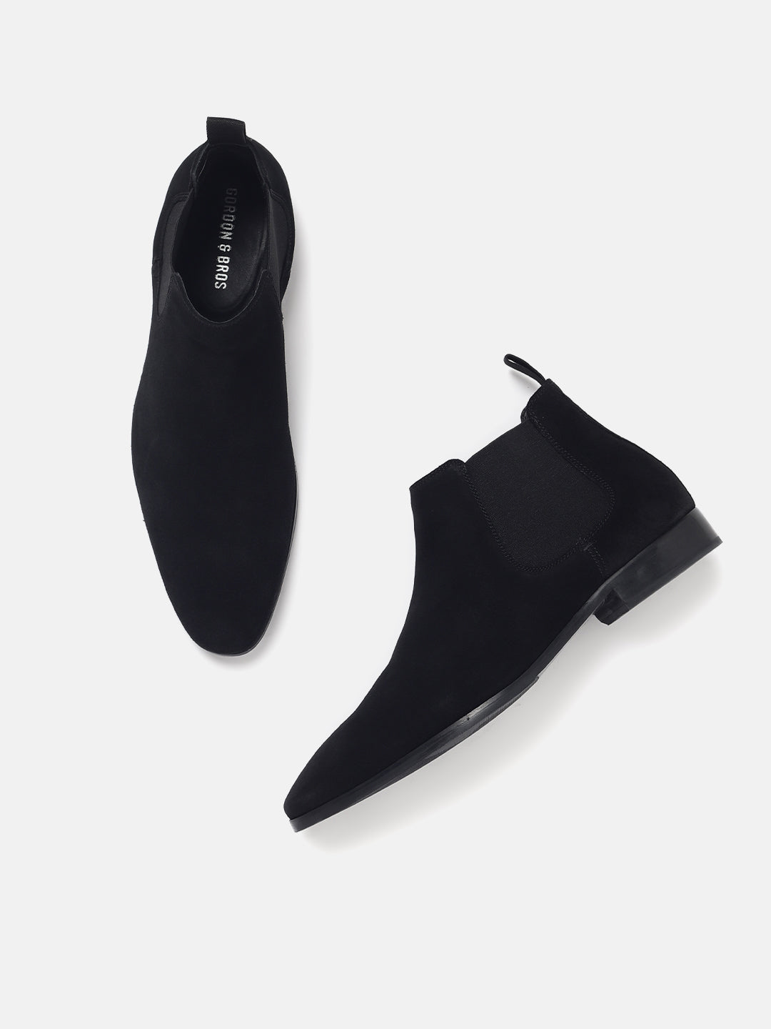 Black suede Chelsea boots for men with elastic side panels and a refined finish ideal for formal and smart-casual wear
