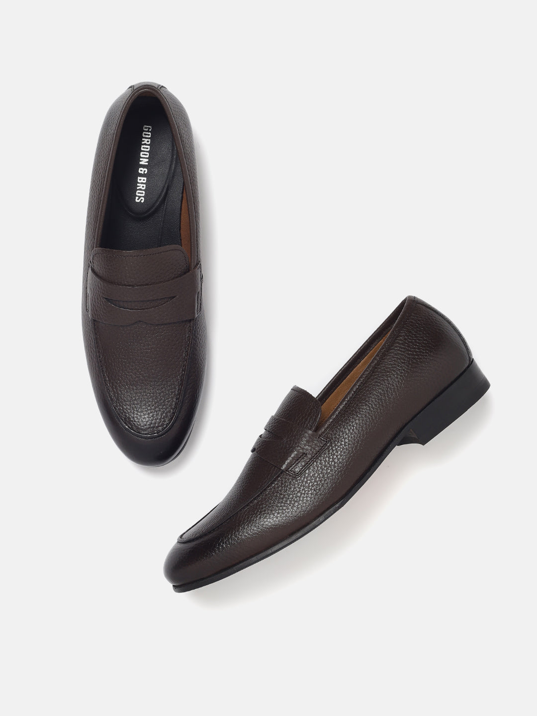 A pair of brown leather men's loafers with a textured pattern, displayed against a white background.