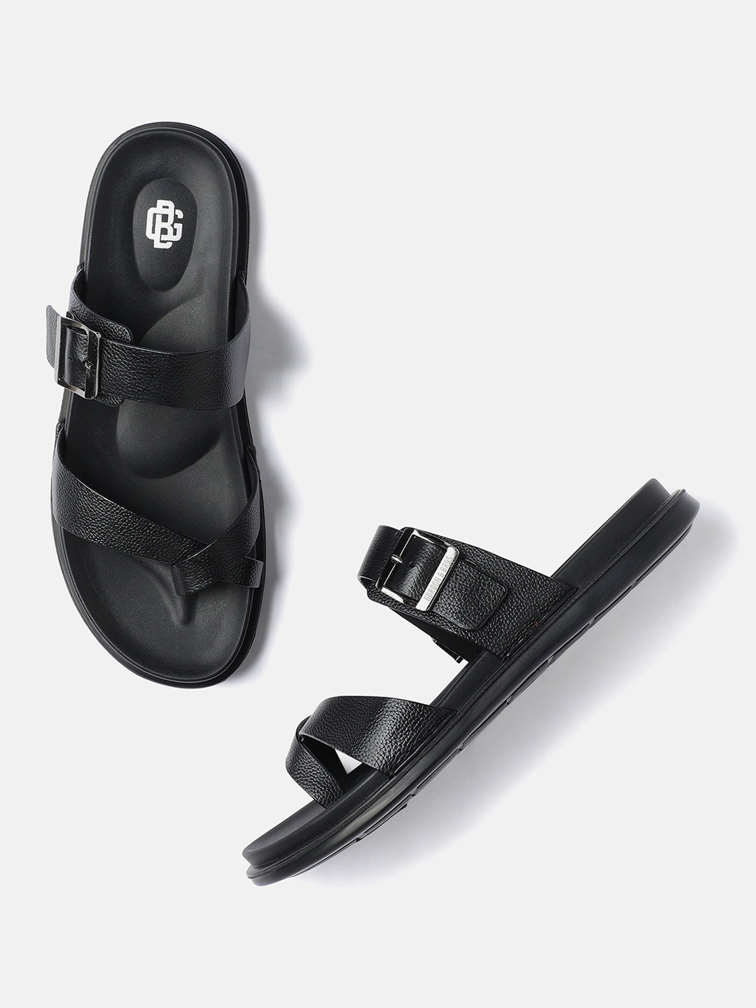 A pair of black men's sandals with adjustable straps and buckle closure, displayed against a white background.