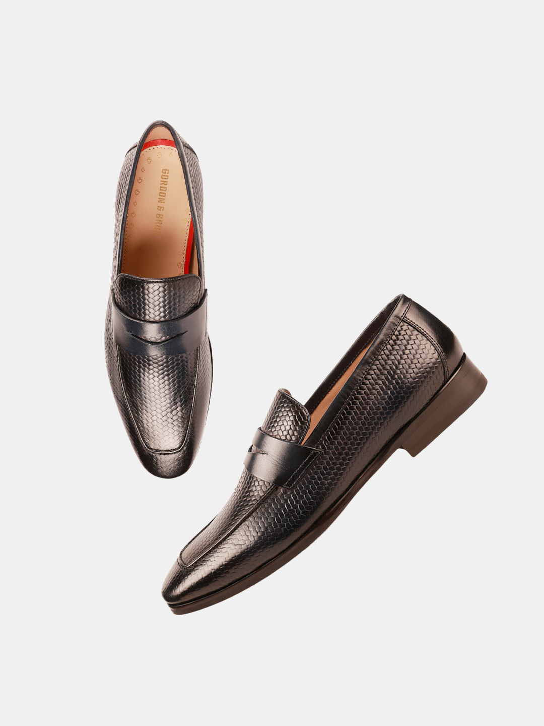 A pair of navy men's loafers with a textured design, displayed against a white background.