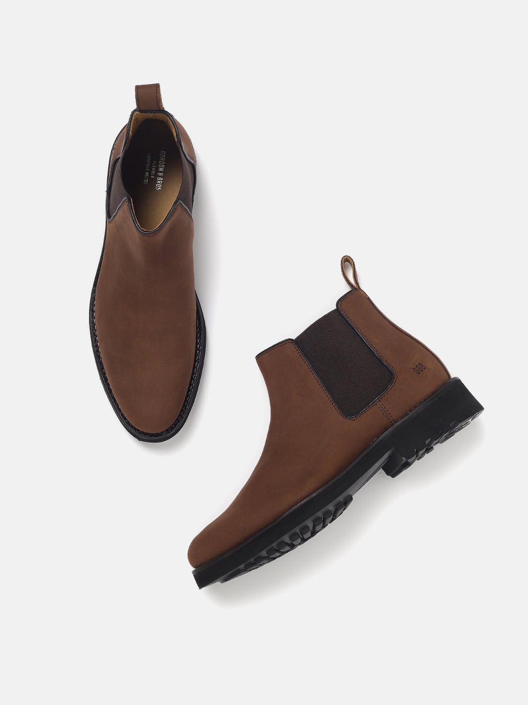 Tan Chelsea boots for men with rugged outsole and elastic side panels — With White Background