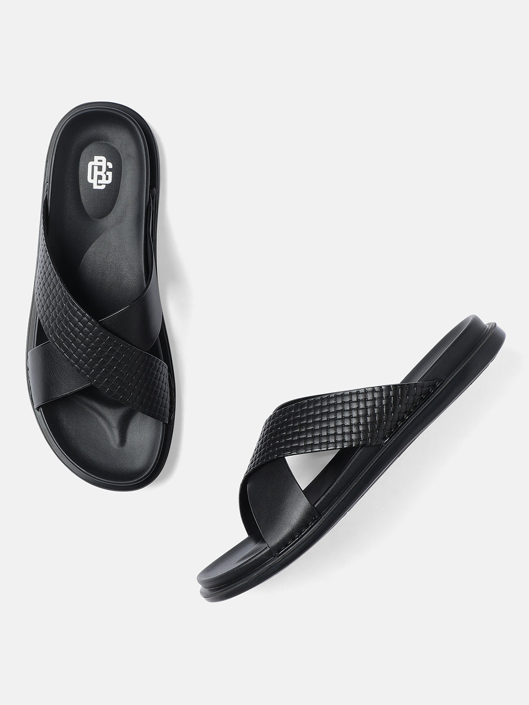 A pair of black men's leather sandals with a textured design on the straps.